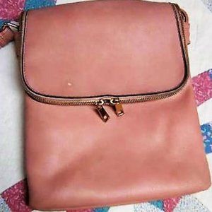 Pink leather crossover purse